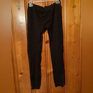 Size says Large but fits Med Women’s Say What yoga pants has zippers on bottoms